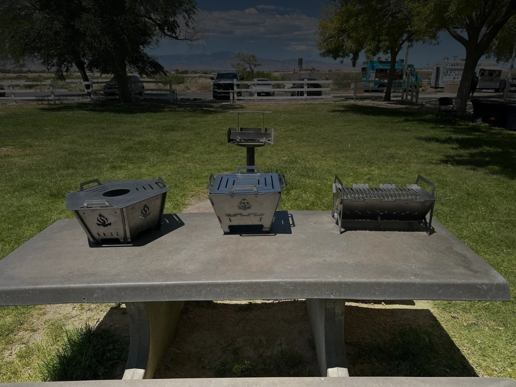Portable tabletop charcoal grill stacker from StackFire Stacks, used as an outdoor fire pit stack for BBQ and camping